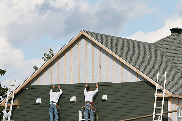 Professional Storm Damage Siding Repair technician working in Aberdeen, MD